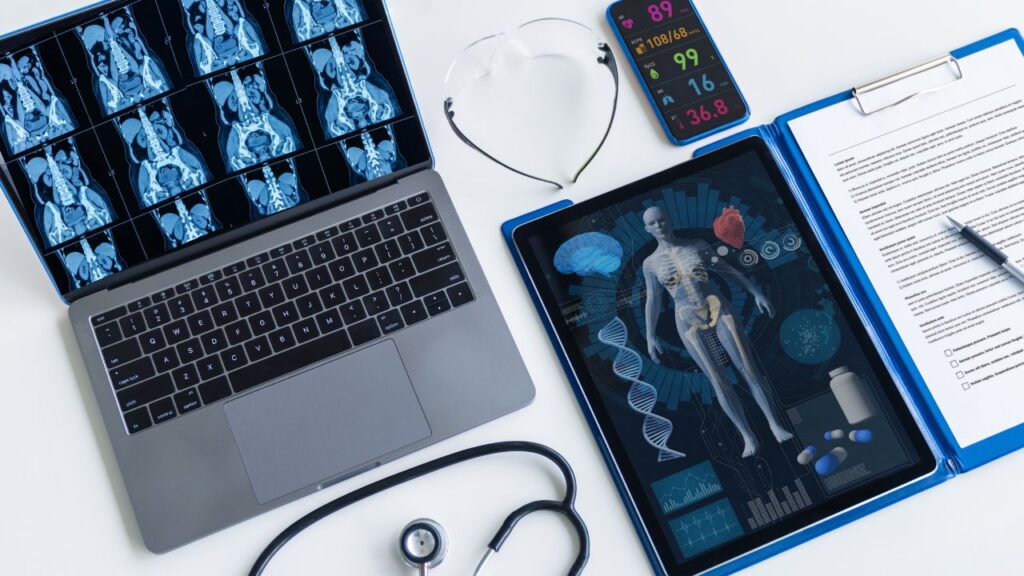 medical desk with scans and charts - why interstitial cystitis needs more research